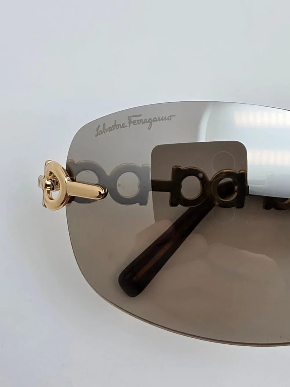 Salvatore Ferragamo 1055 Gold Gancini Frame Gold Mirror Rimless Sunglasses 61mm
